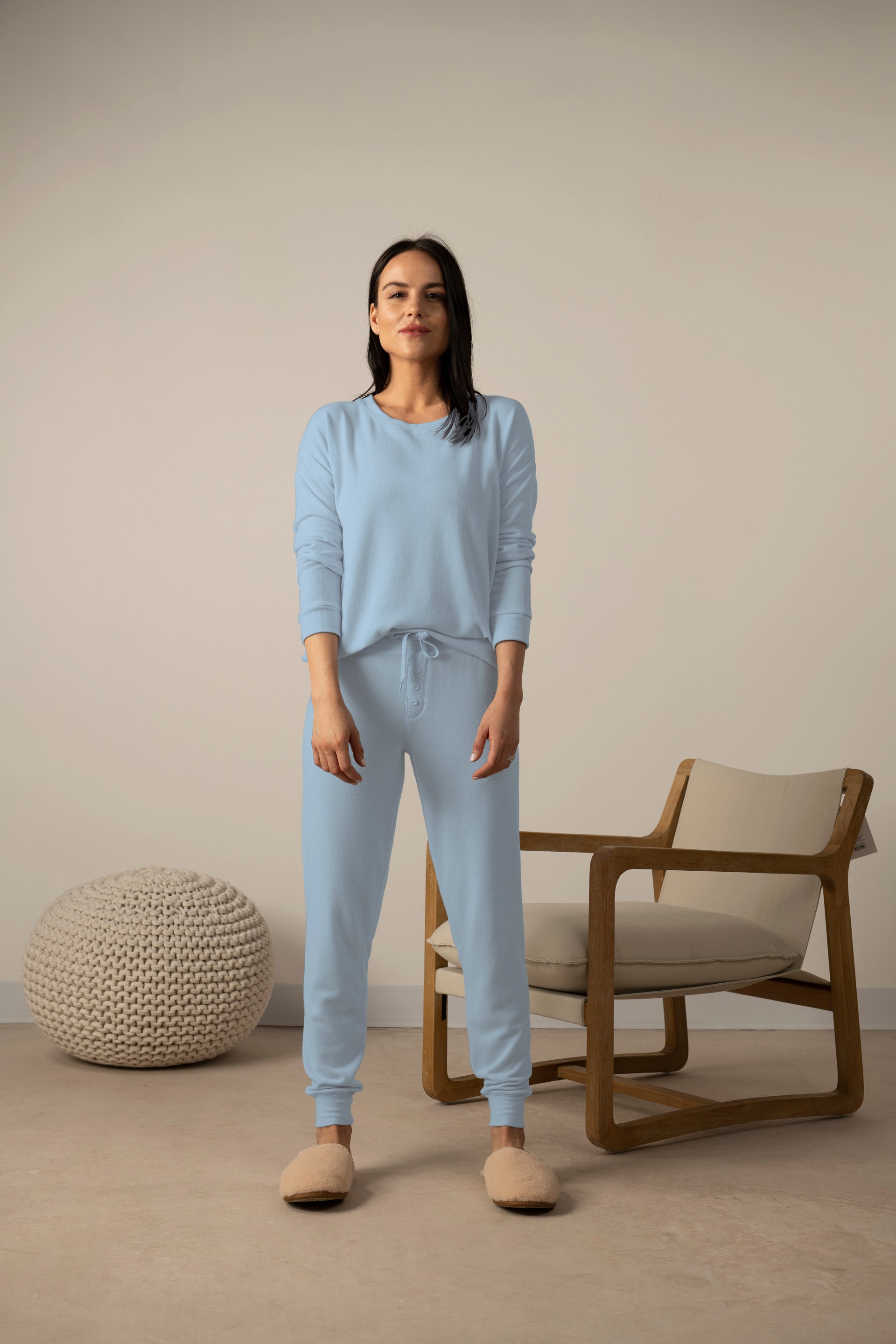Model wearing Morning Blue cozy long sleeve top with relaxed fit and crew neckline
