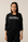 Model wearing black Hello from Aspen long sleeve top with relaxed fit and crew neckline