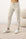 Model wearing Cozy Banded Joggers in Cashmere with relaxed fit and drawstring waist.