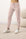 Model wearing Cozy Banded Joggers in Rosewater with relaxed fit and drawstring waist.