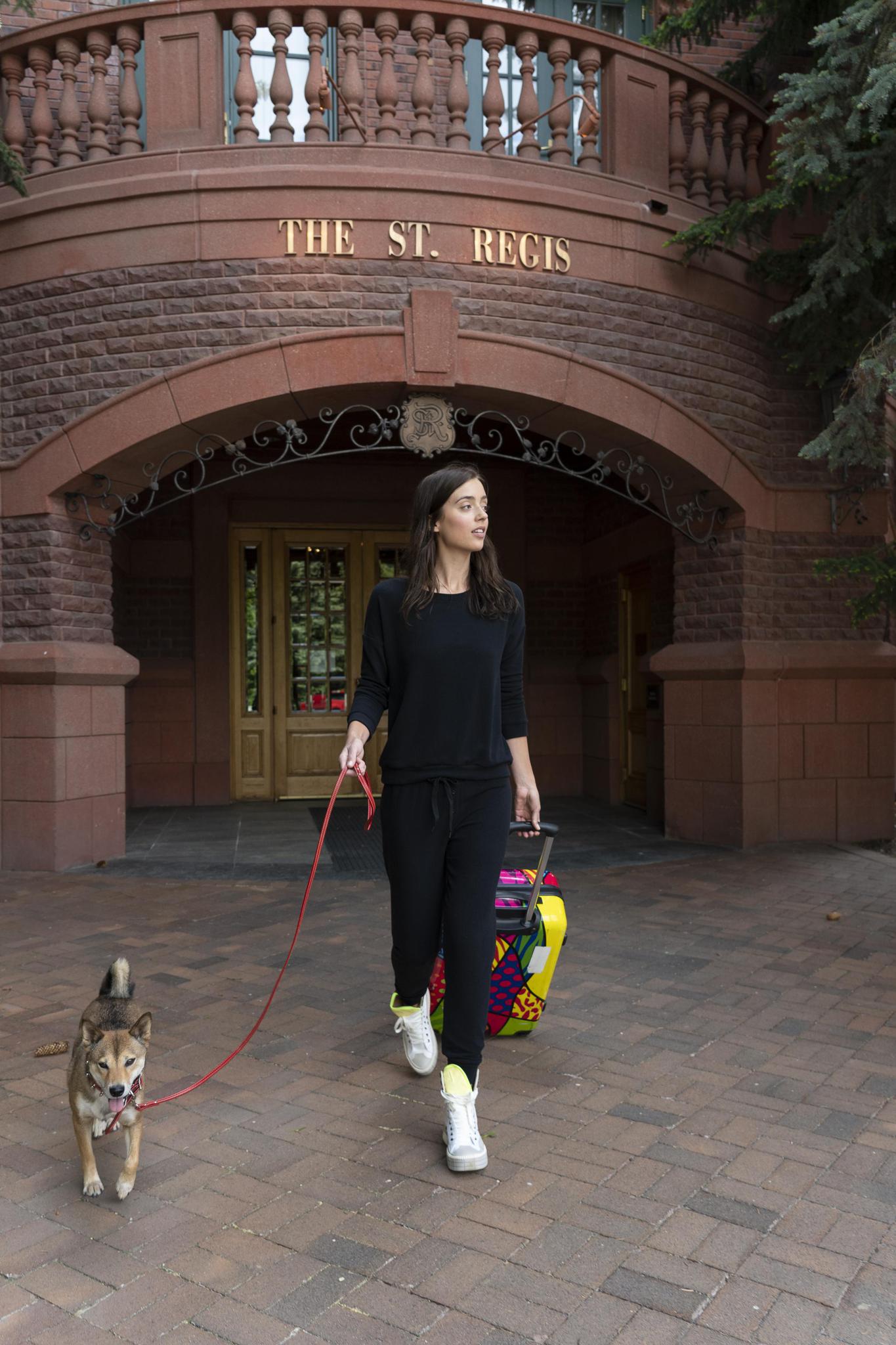 Model wearing the Cozy Banded Joggers in black, relaxed fit, tapered leg, and adjustable drawstring waist, paired with matching long sleeve top.