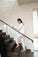 Model wearing Cozy Long Pajama Set in cashmere color with joggers and long-sleeve crew neck top.