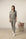 Model wearing Cozy Long Pajama Set in heather gray with crew neck top and relaxed jogger pants.