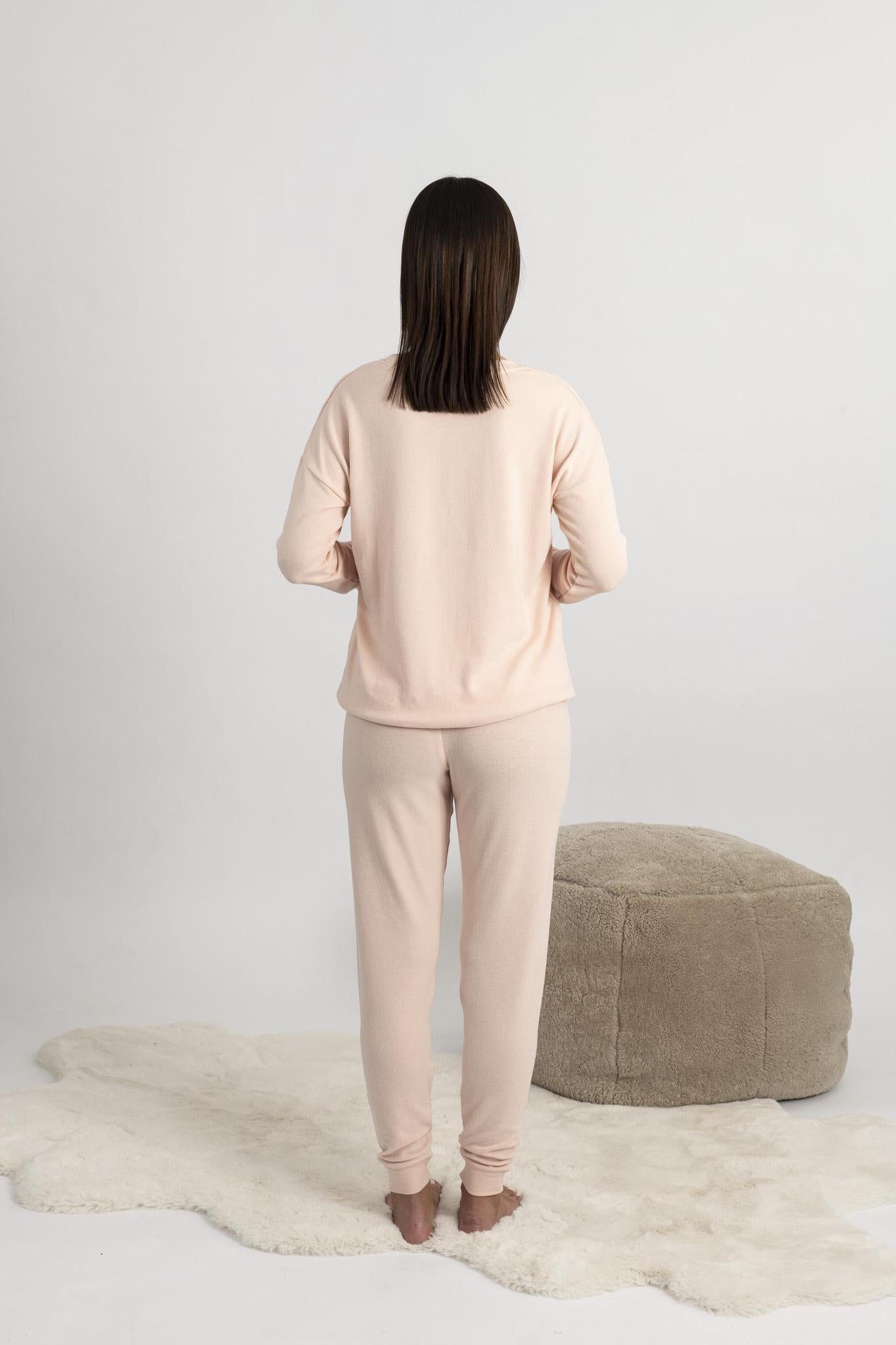 Back view of the peach jogger pajama set showing relaxed fit and soft drape of fabric