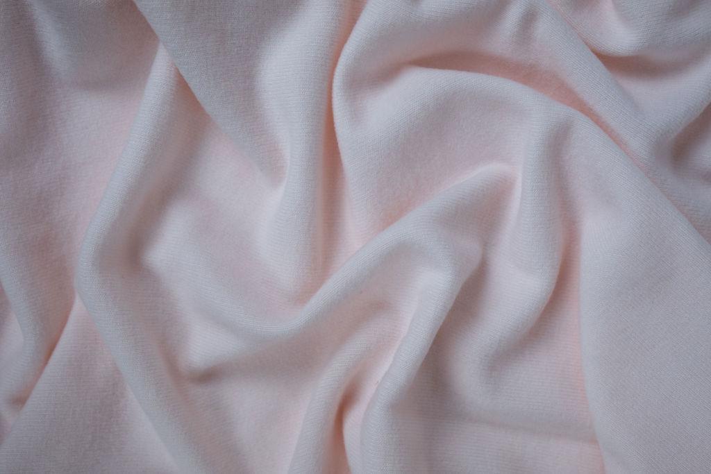 Detail of plant-based cozy fabric made from bamboo, wood pulp, and cotton linters in the rosewater pajama set