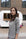 Model wearing Heather Gray cozy long sleeve top with relaxed silhouette and crew neckline