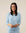 Model wearing Morning Blue cozy long sleeve top with relaxed fit and crew neckline