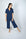 Model wearing Jolene Cropped Pajama Set in navy with ivory buttons, short-sleeve top, and mid-rise cropped pants