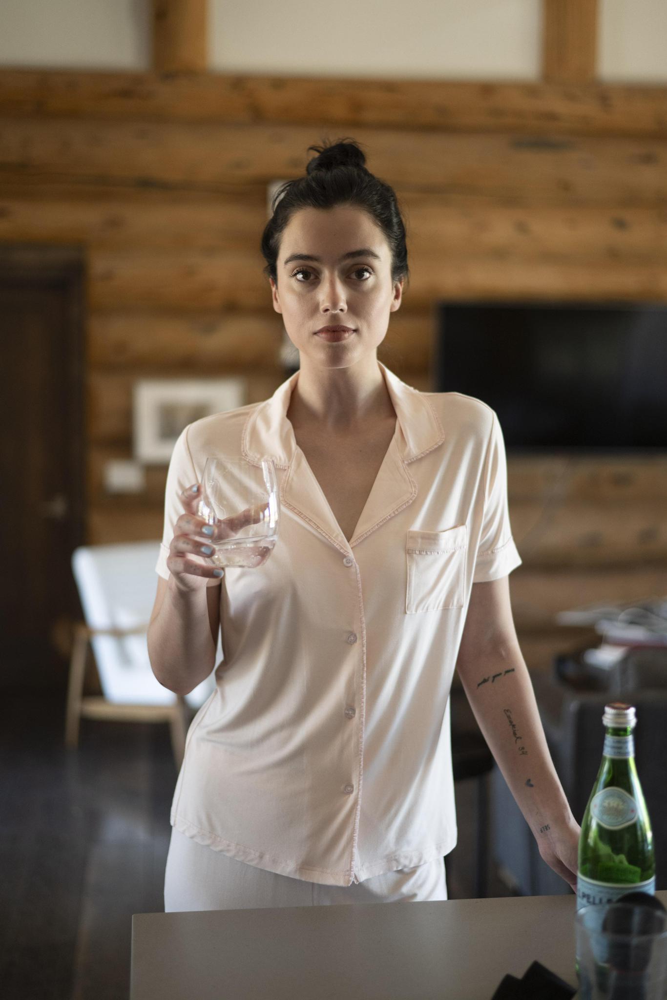 Model wearing Jolene Short Pajama Set in Rosewater with short-sleeve button-down top and mid-rise shorts