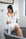 Model wearing Nora Racerback Chemise in Ivory with lace detail and smooth bamboo fabric