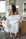 Back view of Ivory Nora robe showing gathered waist and short length