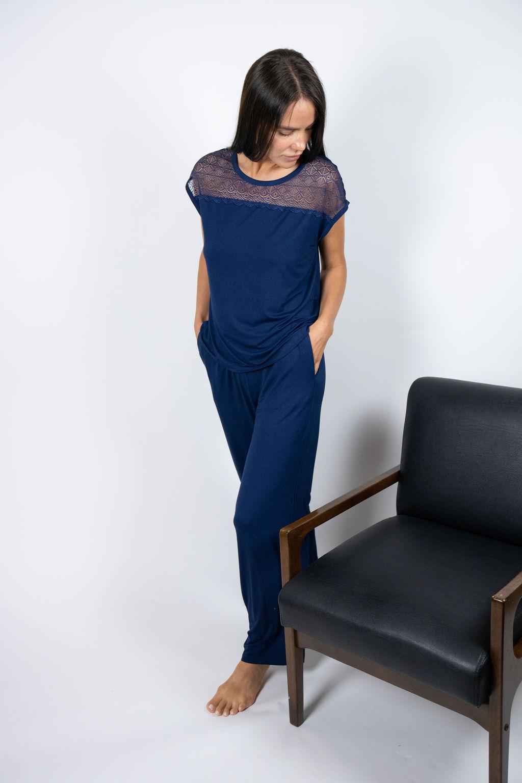Model wearing Nora T-Shirt and Pants Set in navy with lace-paneled bamboo top and wide-leg pants