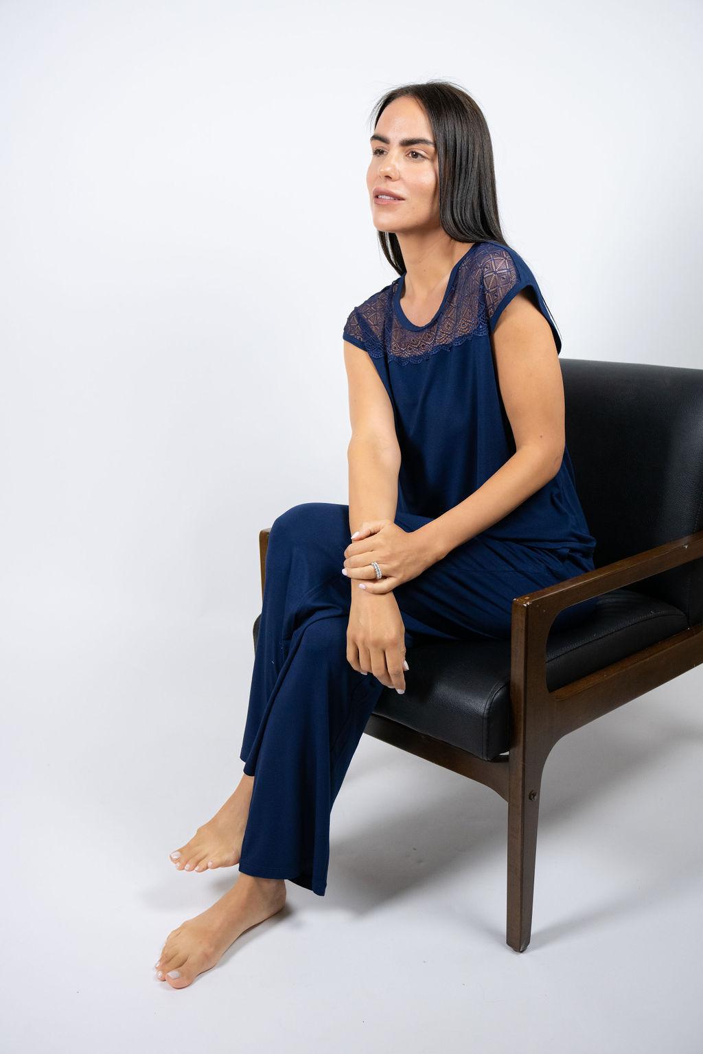 Model wearing Nora T-Shirt and Pants Set in navy with lace-paneled bamboo top and wide-leg pants