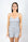 Model wearing silver ribbed cami top with built-in shelf bra and matching shorts with gold button details