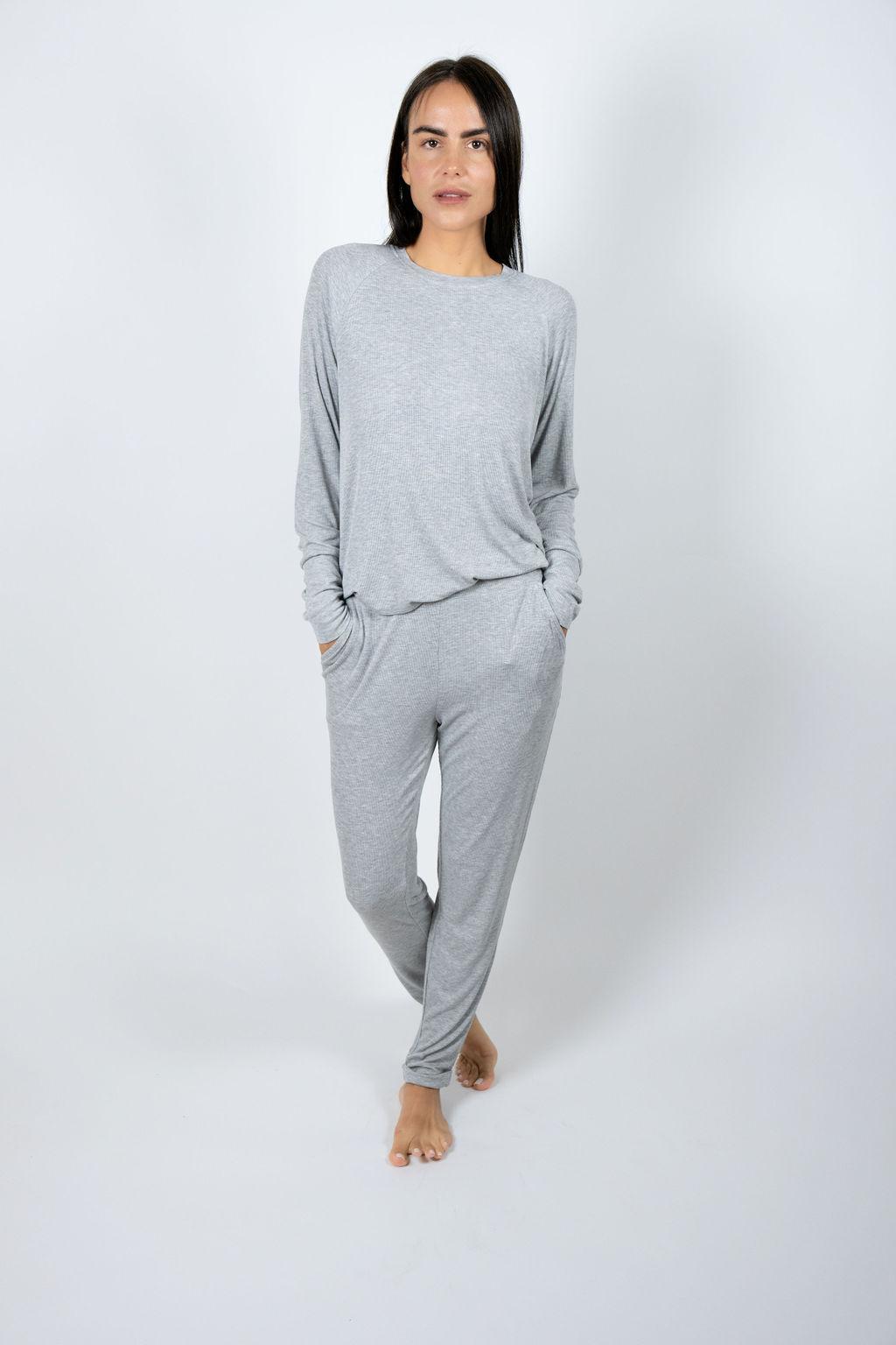 Model wearing Ribbed Joggers in Silver with relaxed fit and drawstring waistband.