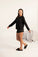 Model wearing Miley long sleeve top in black with relaxed fit and crew neckline with matching shorts