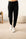 Model wearing the Cozy Banded Joggers in black, relaxed fit, tapered leg, and adjustable drawstring waist.