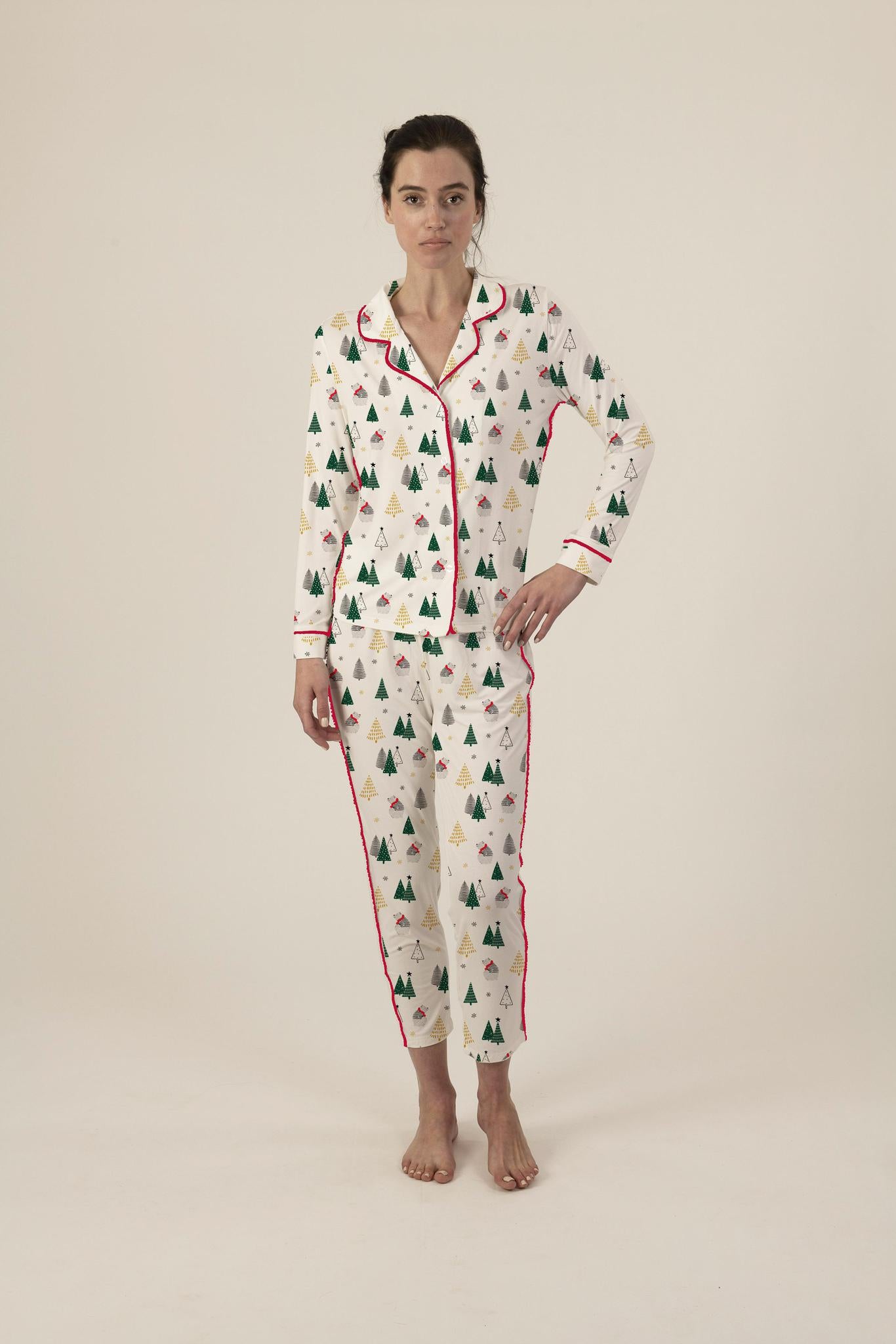 Model wearing Aspen Dream Bears Pajama Set with long sleeve button-down top and ankle-length pull-on pants