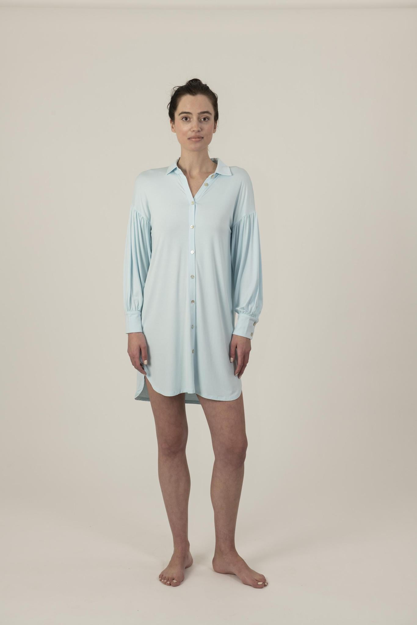 Model wearing the Dahlia Chic Nightshirt in Ice Blue with gathered neckline and button-down front