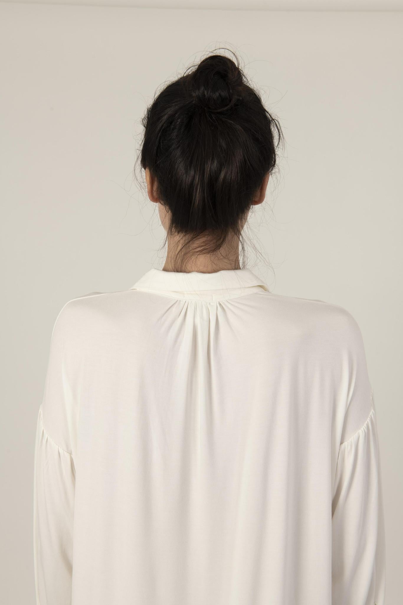Back view of the Dahlia Nightshirt in ivory showing relaxed fit and graceful drape