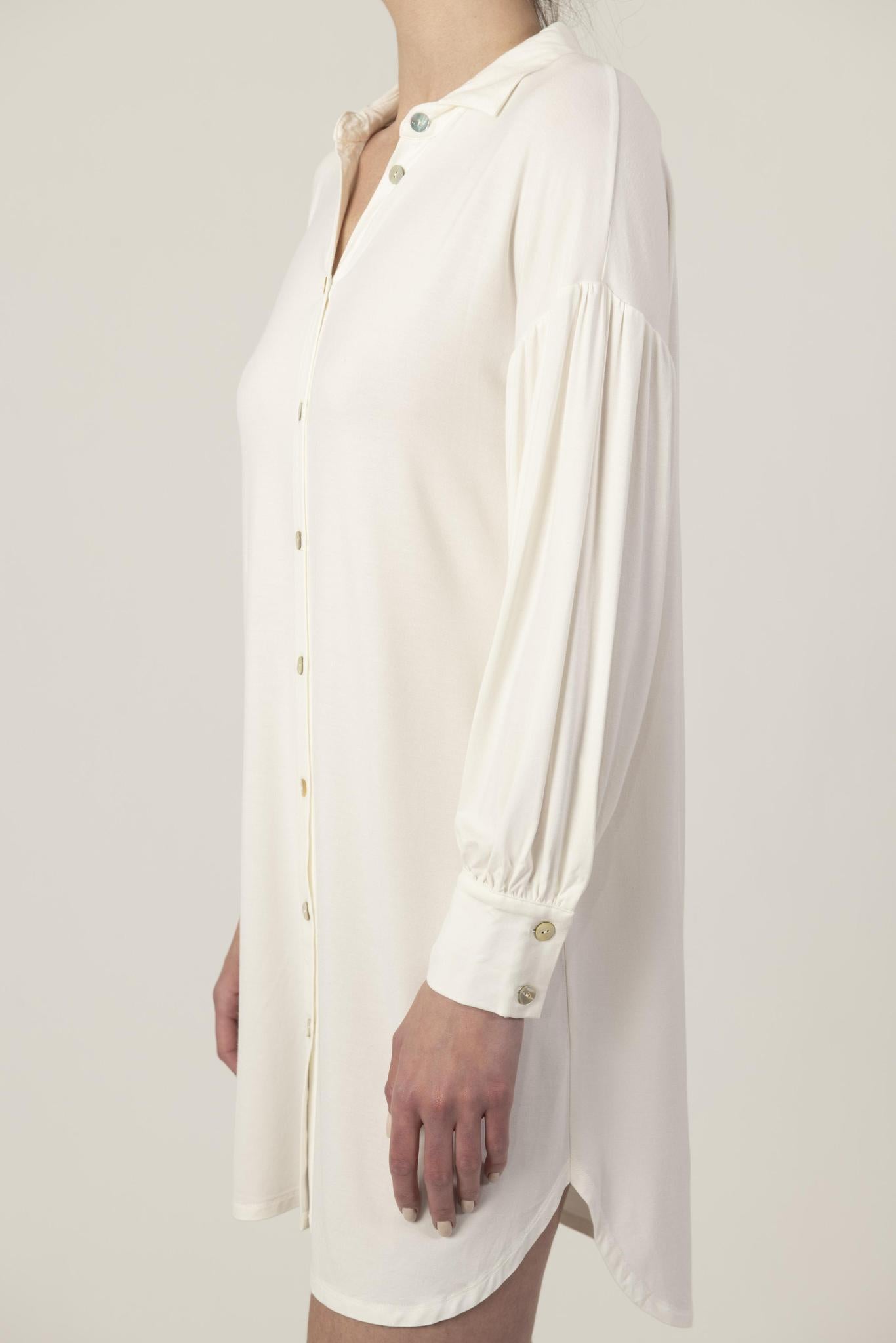 Side view of the Dahlia Nightshirt in ivory showing relaxed fit and graceful drape