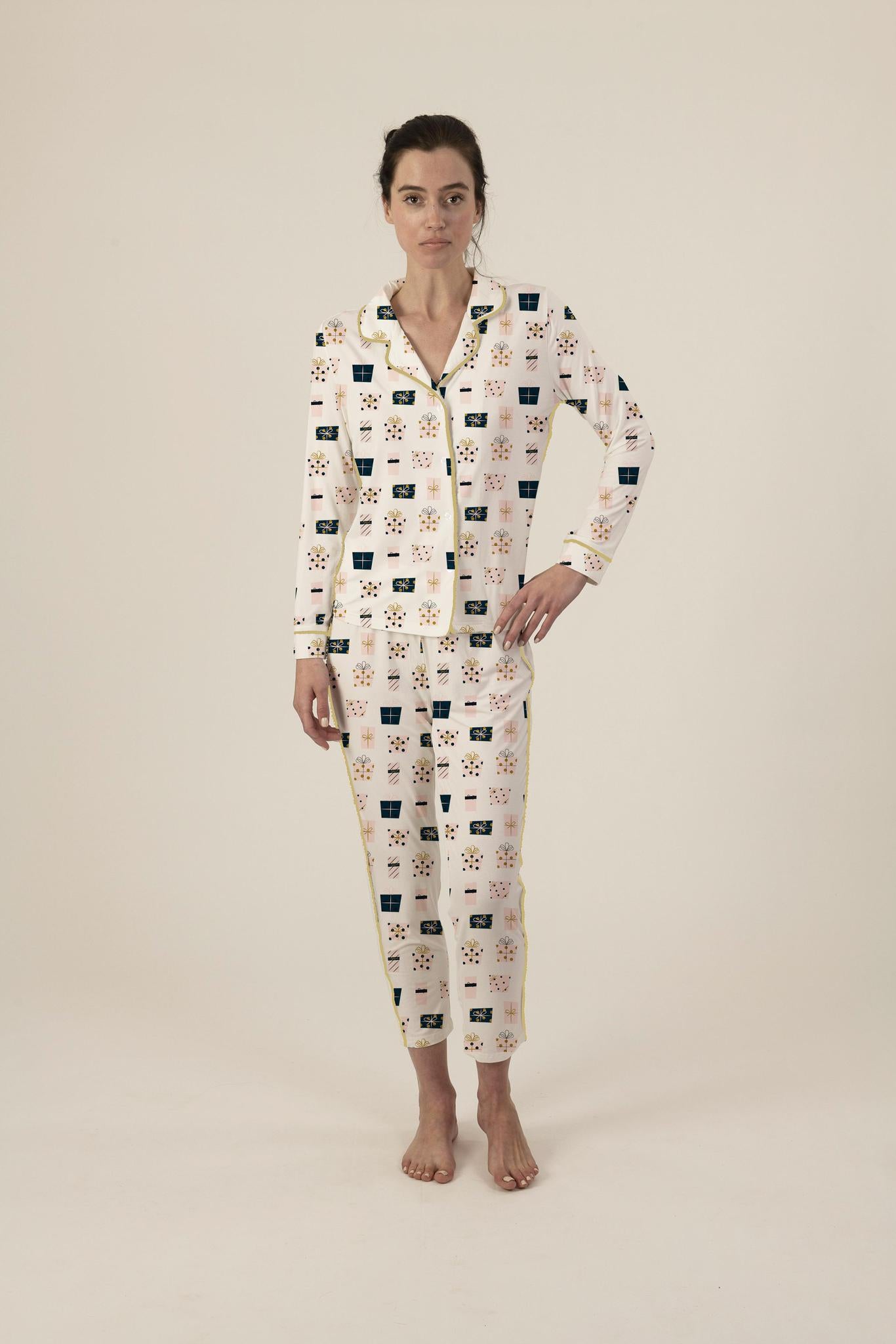 Model wearing the Mother’s Day Gift Print pajama set with hand-drawn gift boxes and ankle-length flared pants