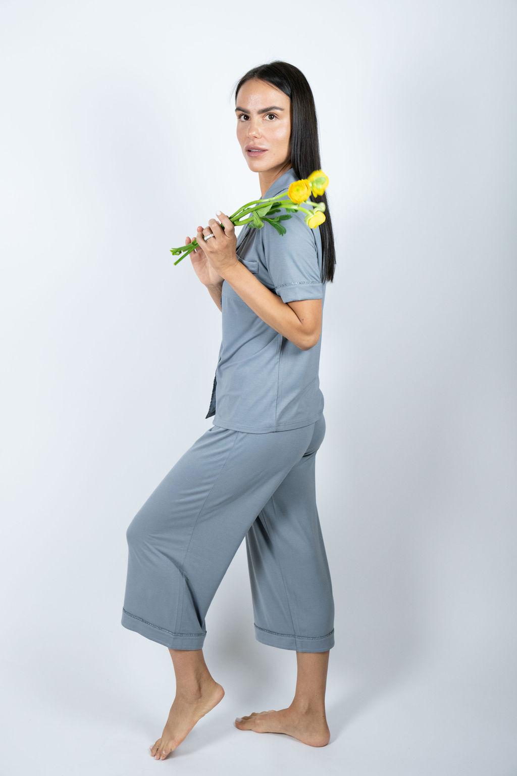 Model wearing Jolene Cropped Pajama Set in Night Owl with short-sleeve button-down top and mid-rise cropped pants.
