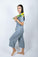 Model wearing Jolene Cropped Pajama Set in Night Owl with short-sleeve button-down top and mid-rise cropped pants.