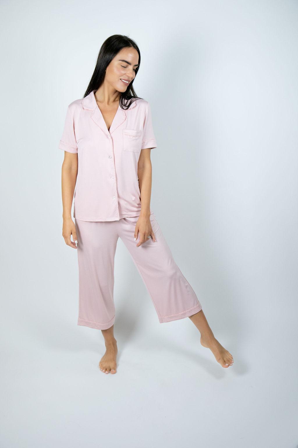 Model wearing Jolene Cropped Pajama Set in Powder Rose with short-sleeve button-down top and mid-rise cropped pants.