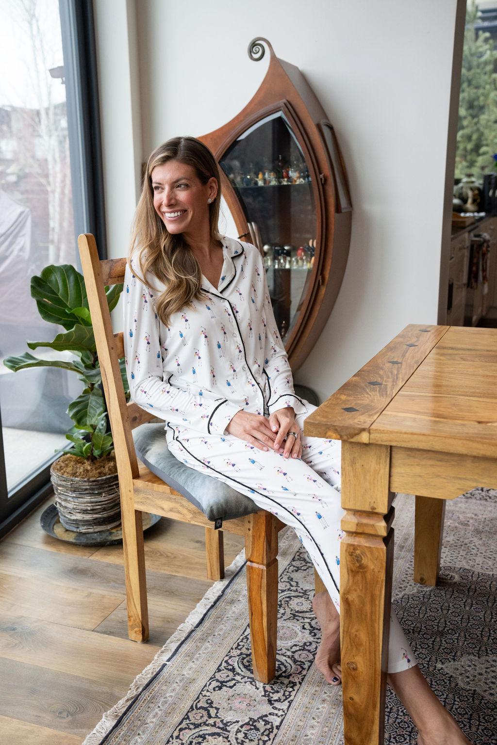 Model wearing Jolene Long Pajama Set with hand-drawn golf print, piped button-down top, and ankle-length flared pants