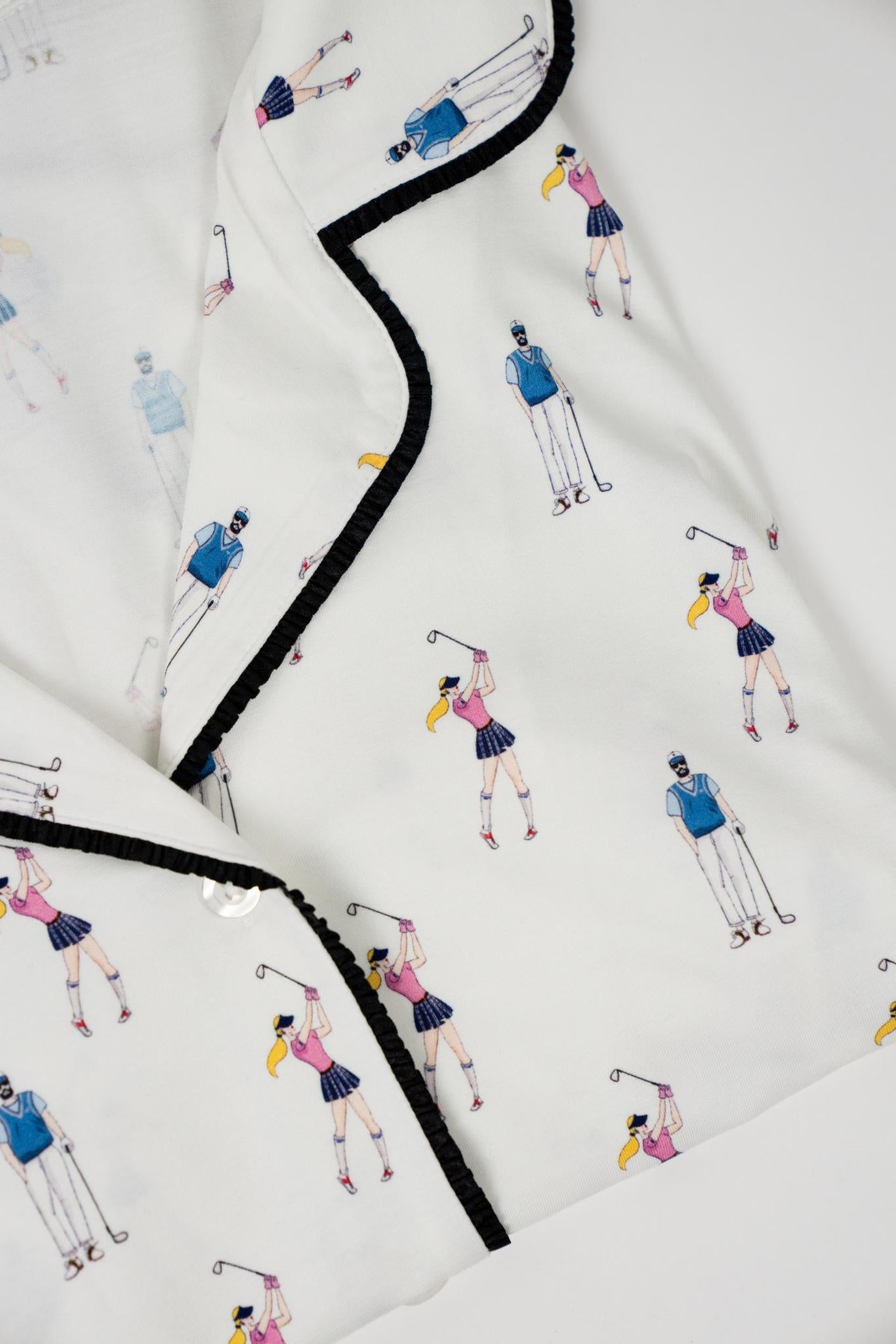 Close-up of Aspen-designed hand-drawn golf illustrations on ivory bamboo fabric