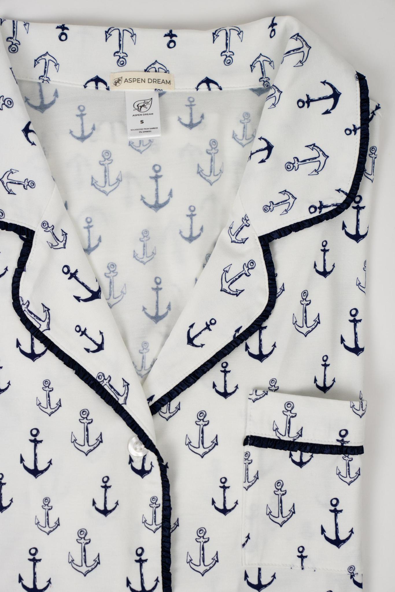 Flat lay of the Jolene Short Pajama Top in Anchor Print with piped button-down top