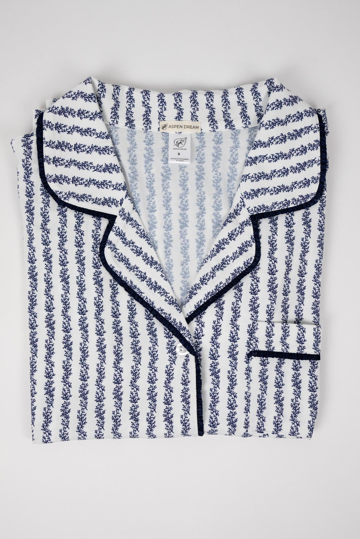 Flat lay of the Jolene Short-Sleeve Pajama Top with blue coral print