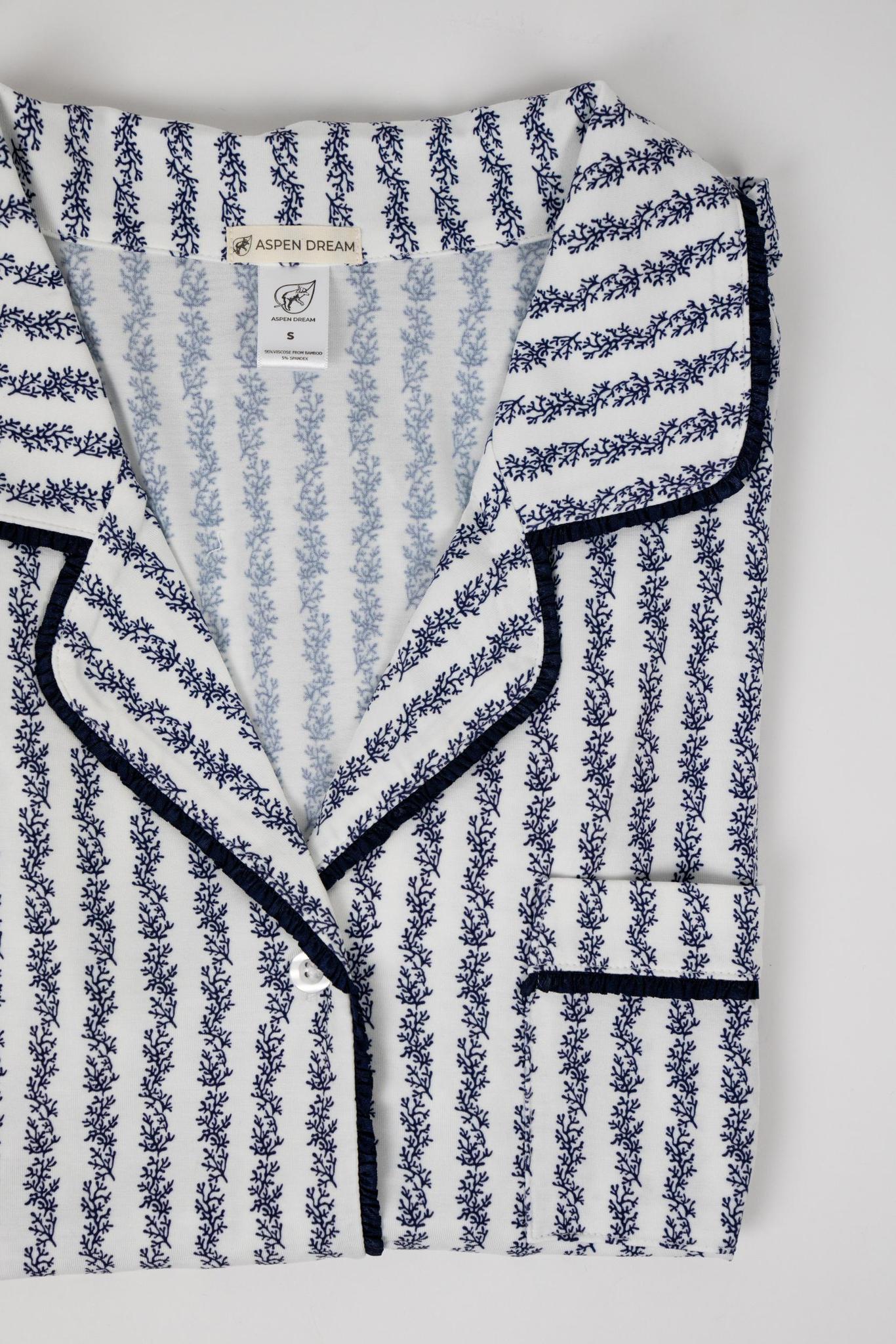 Flat lay of the Jolene Short-Sleeve Pajama Top with blue coral print