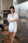 Model wearing Jolene Short Pajama Set with hand-drawn golf print, black ruffled piping, and button-down short-sleeve top