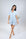 Model wearing Jolene Short Pajama Set in Ice Melt with short-sleeve button-down top and mid-rise shorts