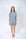 Model wearing Jolene Short Pajama Set in Night Owl with short sleeves, button-down top, and mid-rise shorts.