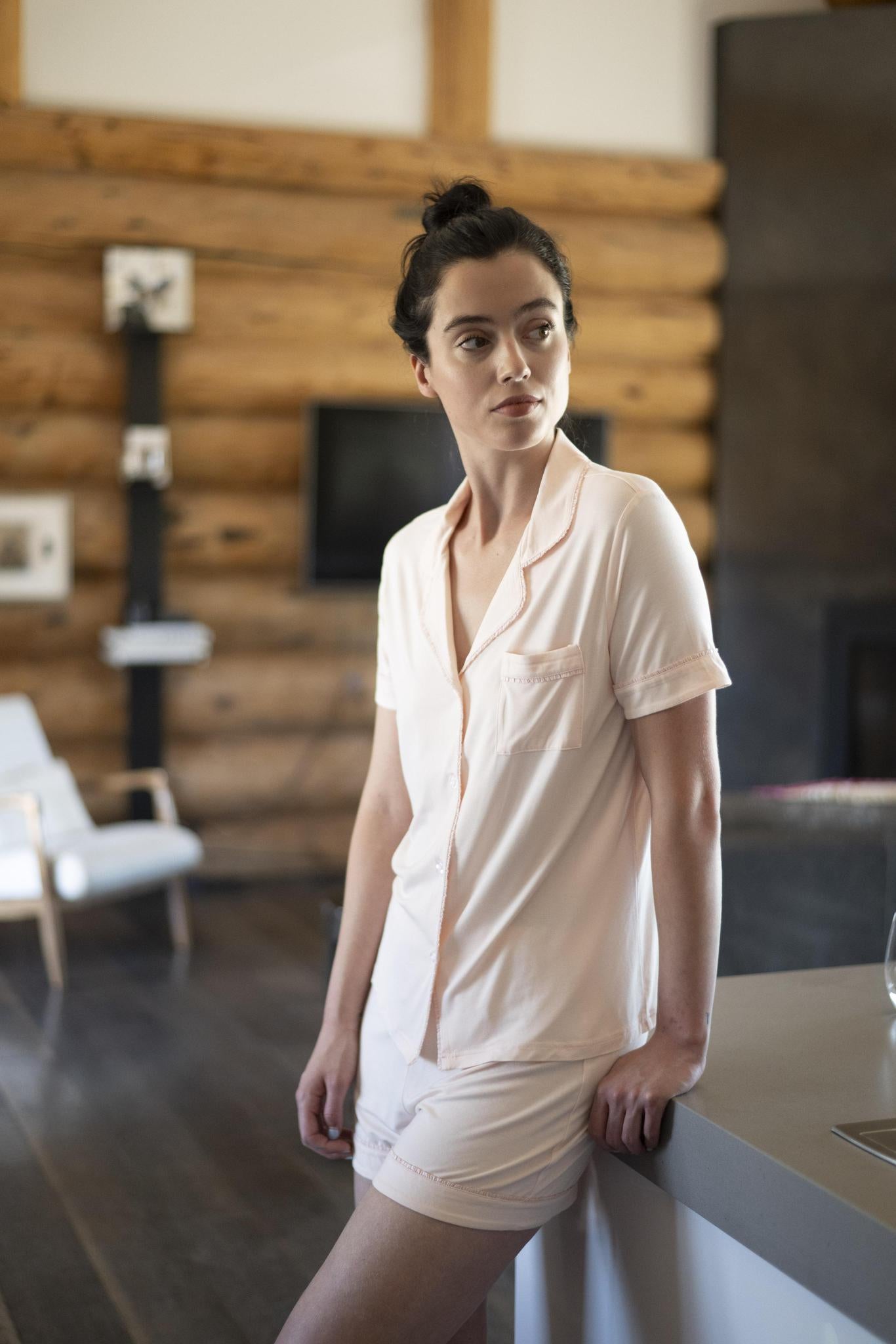 Model wearing Jolene Short Pajama Set in Rosewater with short-sleeve button-down top and mid-rise shorts