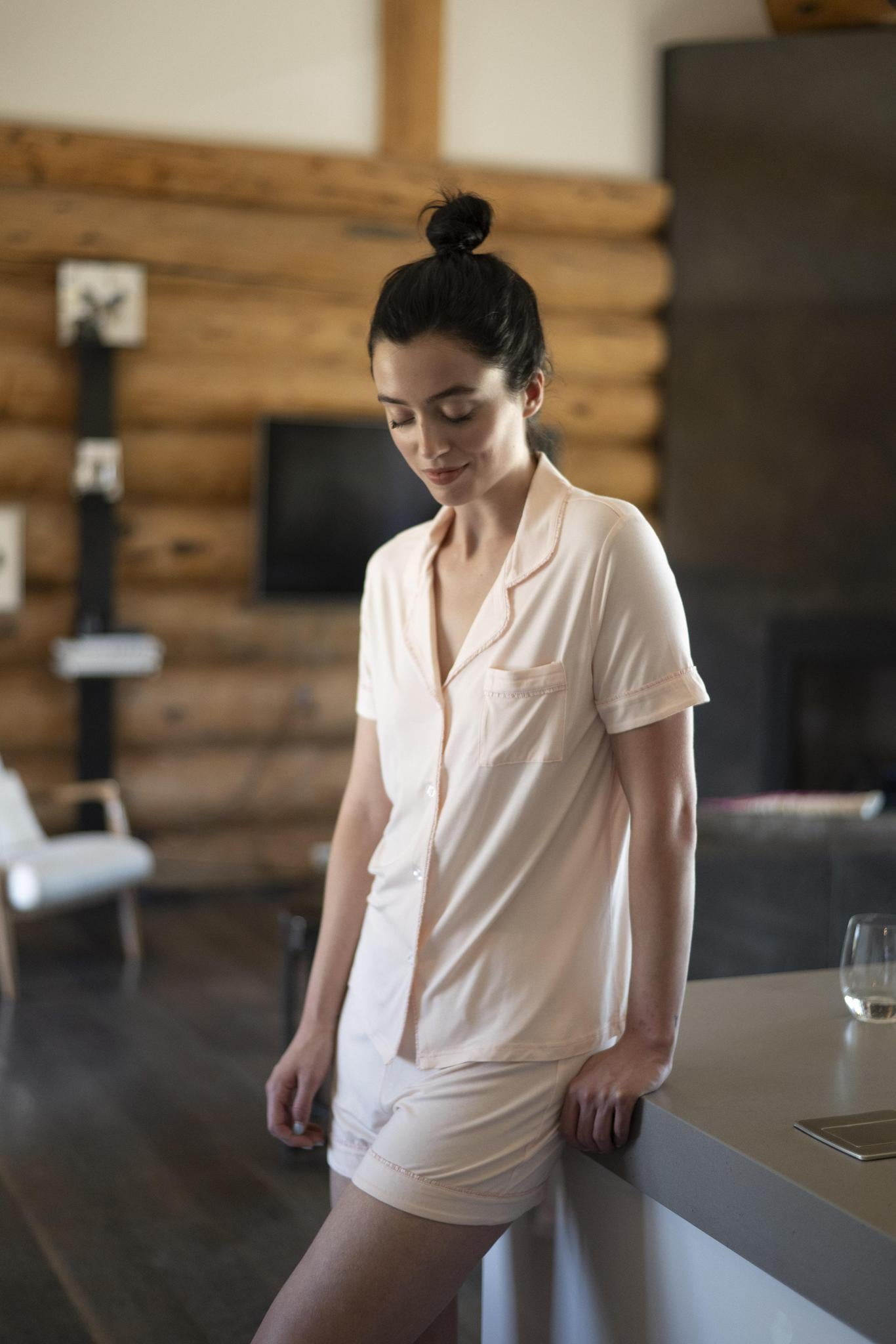 Model wearing Jolene Short Pajama Set in Rosewater with short-sleeve button-down top and mid-rise shorts
