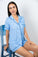 Model wearing Jolene Short Pajama Set with Yacht Club print, featuring button-down top and mid-rise shorts.