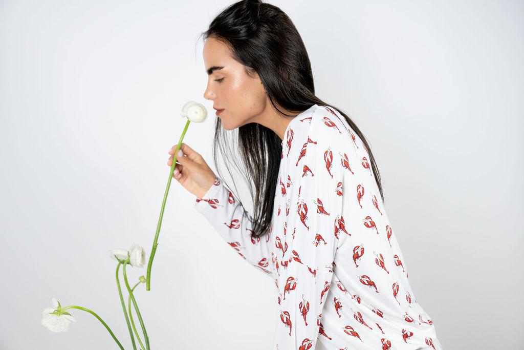 Model wearing Loose Lounge Set with lobster print, featuring a long sleeve top with adjustable waist tie and relaxed pants.