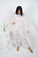 Model wearing Loose Lounge Set with lobster print, featuring a long sleeve top with adjustable waist tie and relaxed pants.