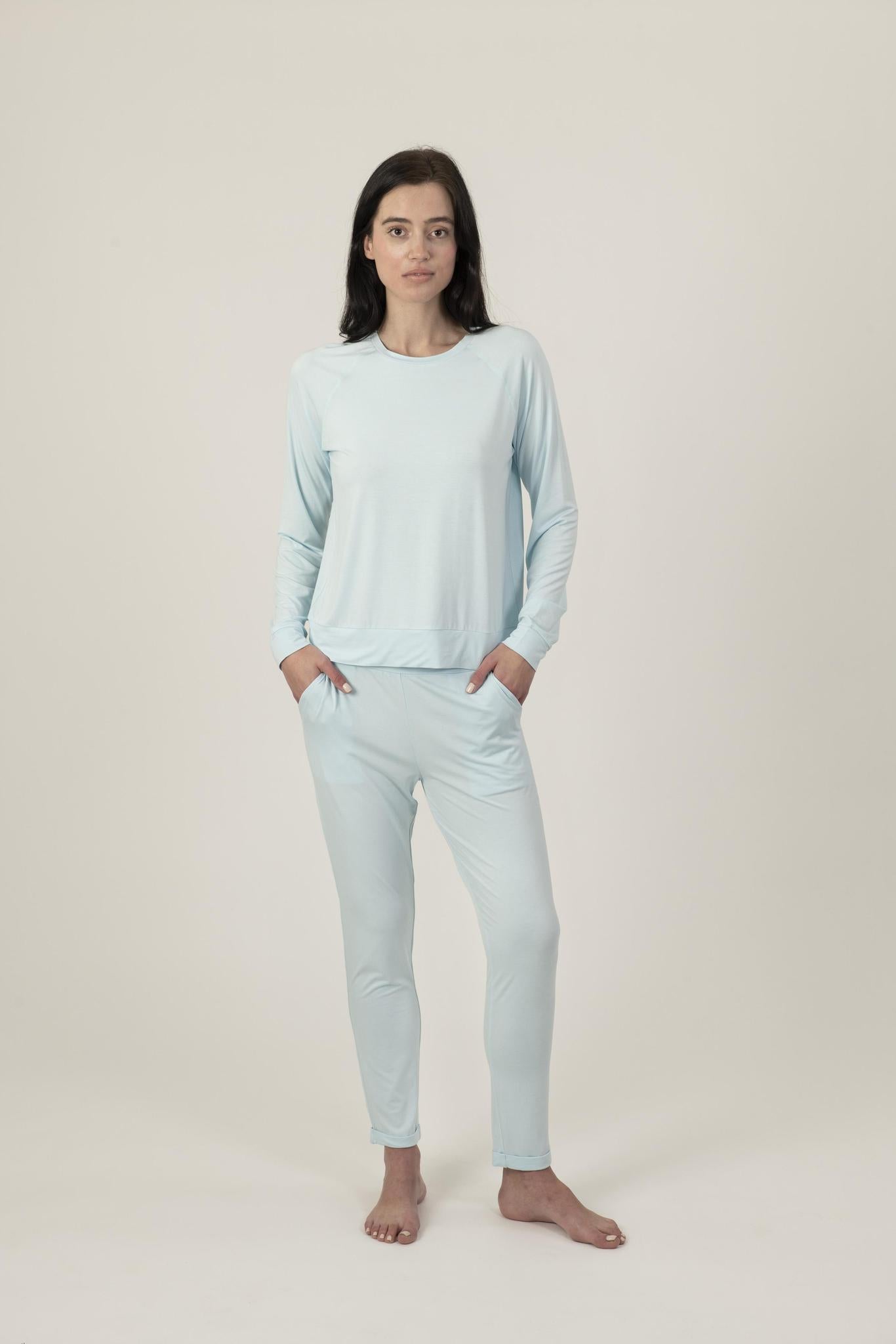 Model wearing Ice Melt lounge set with long raglan sleeve top and full-length drawstring pants