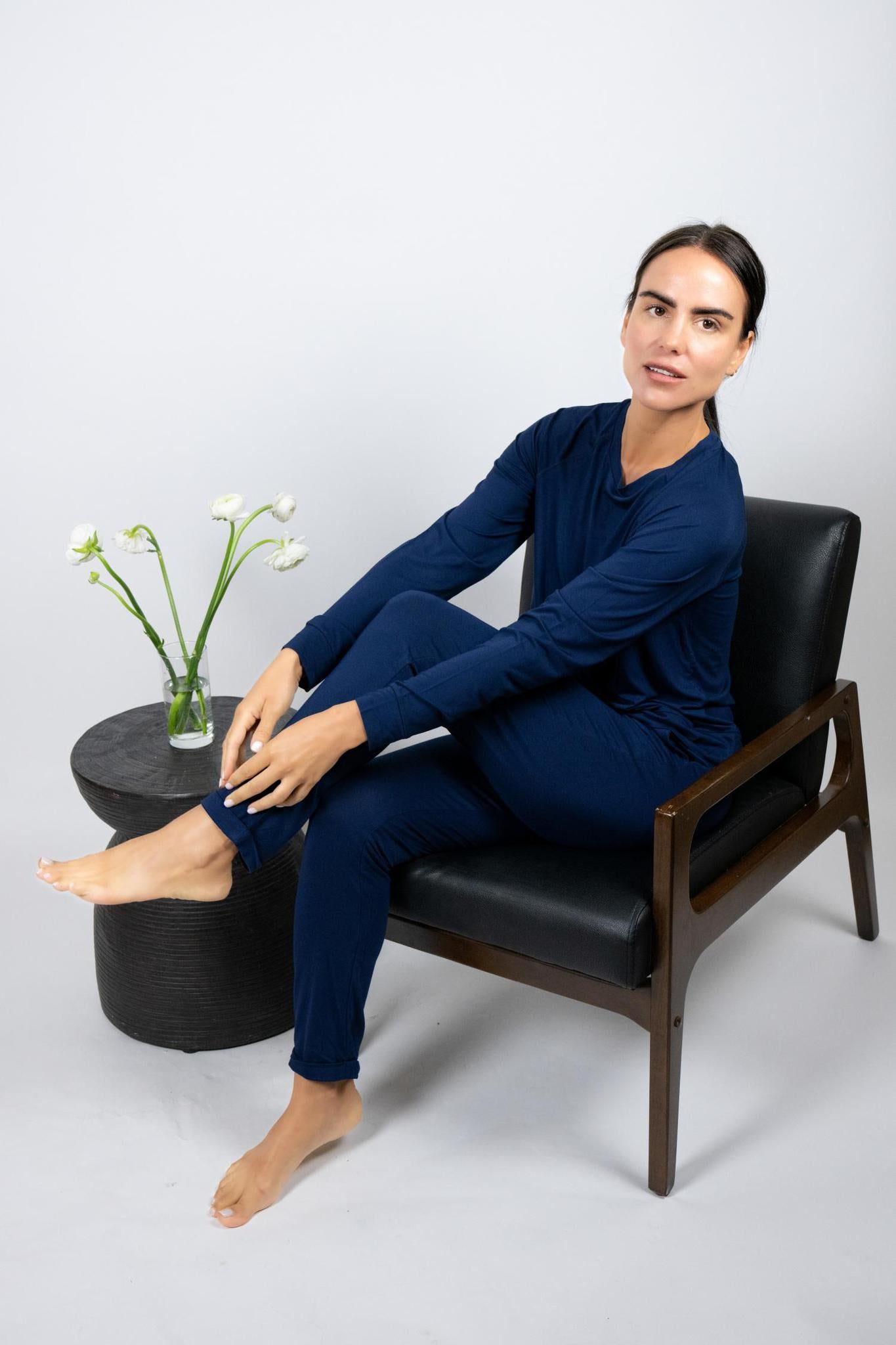 Model wearing Navy lounge set with long raglan sleeve top and full-length drawstring pants