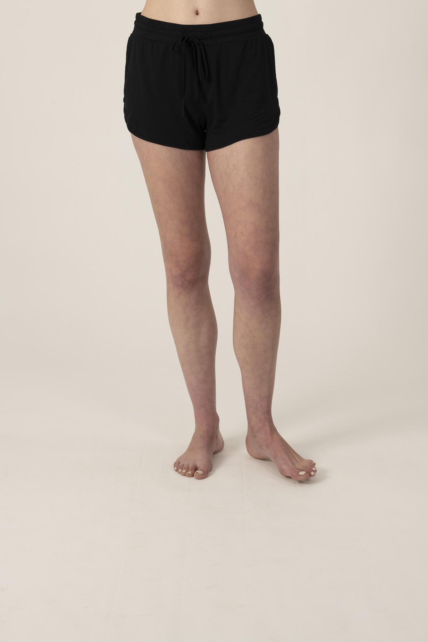 Model wearing Black lounge drawstring shorts