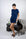 Model wearing Navy lounge short set with rolled sleeve top and drawstring shorts