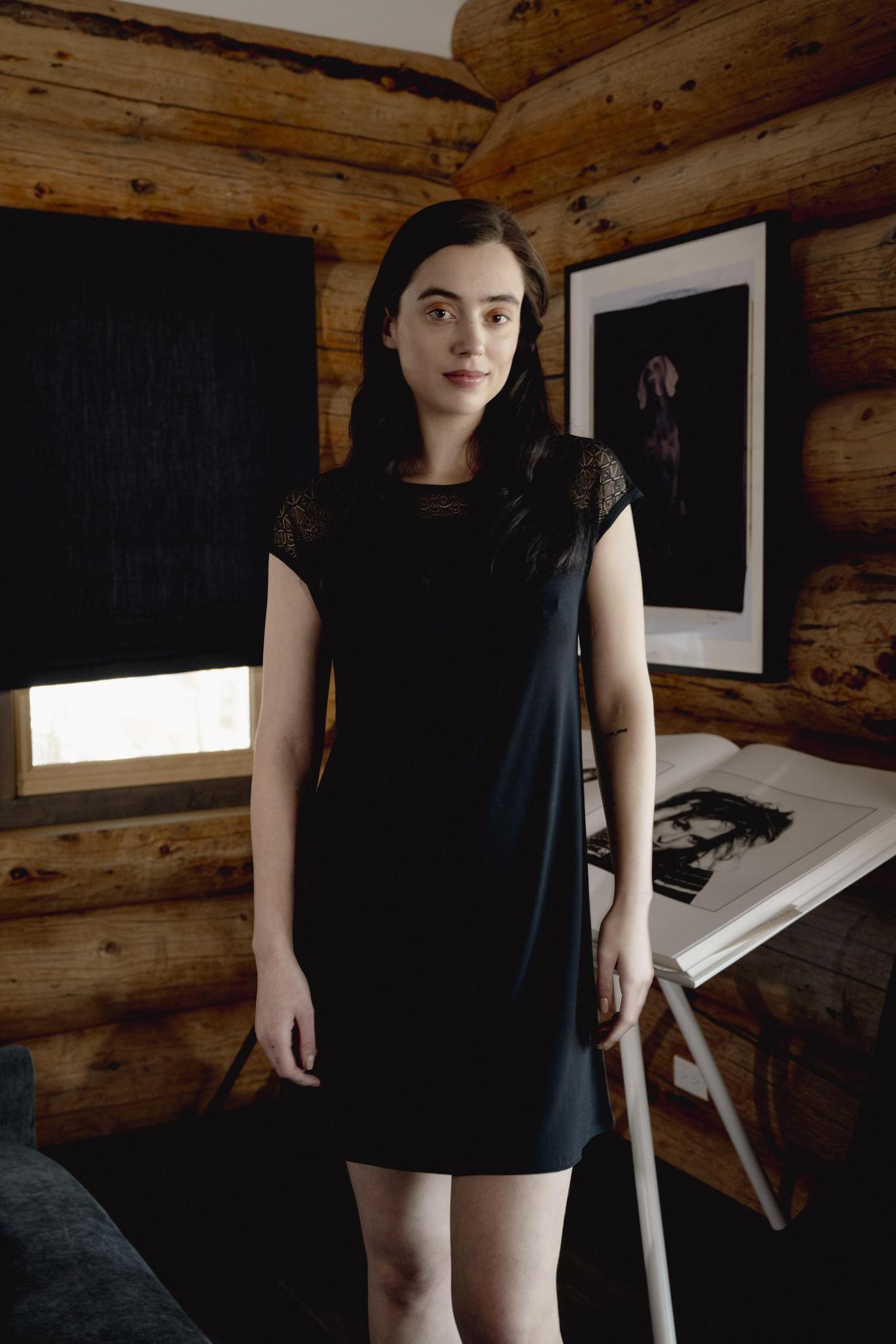 Model wearing Nora T-Shirt Dress in black with lace panel detailing and relaxed silhouette