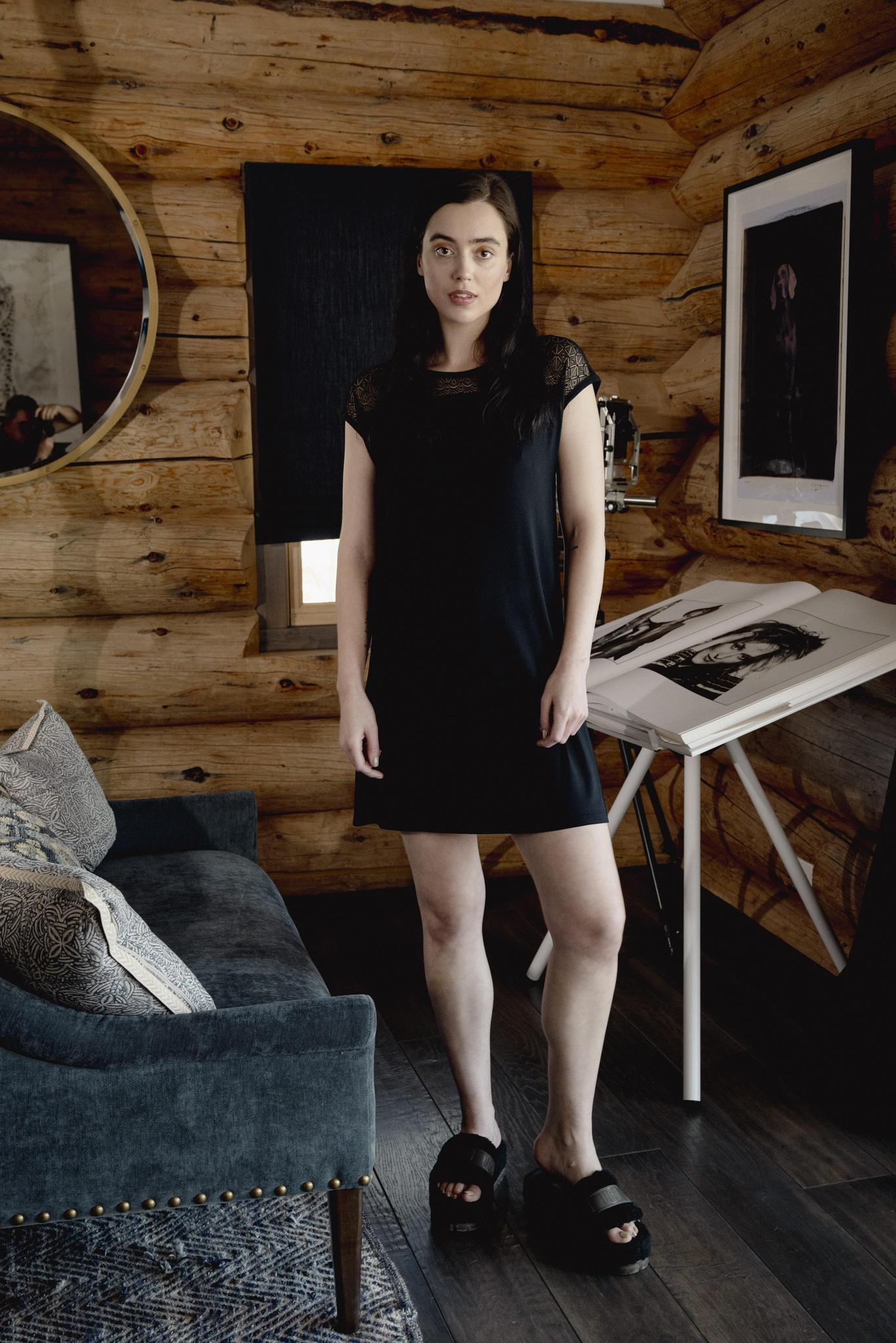 Model wearing Nora T-Shirt Dress in black with lace panel detailing and relaxed silhouette