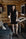 Model wearing Nora T-Shirt Dress in black with lace panel detailing and relaxed silhouette