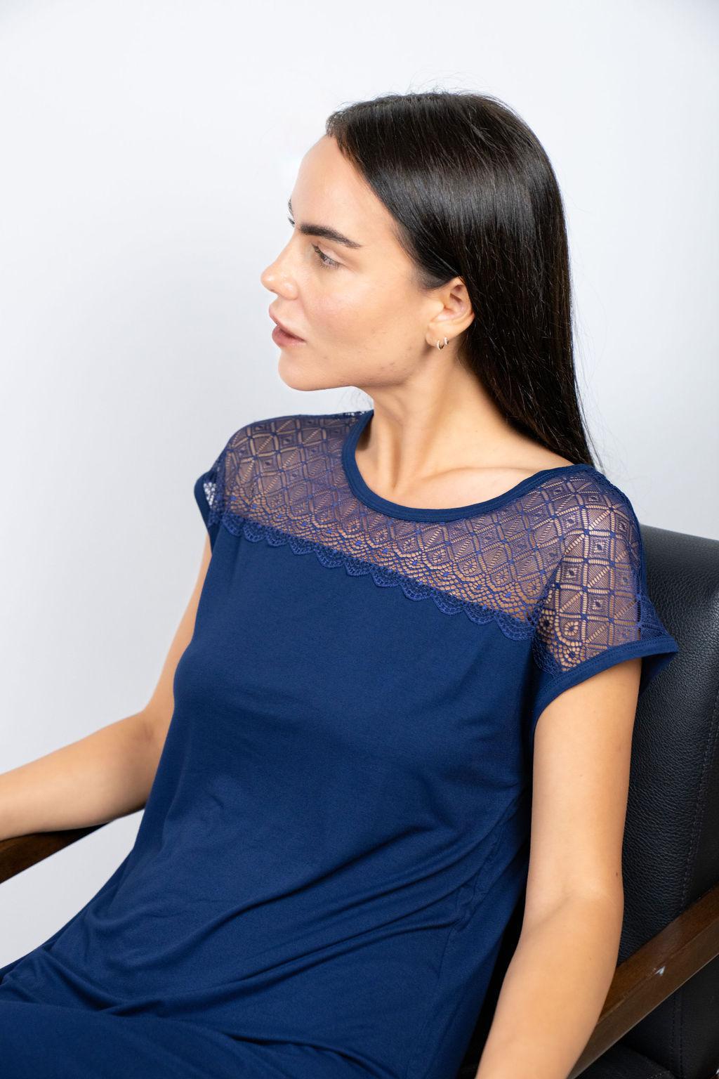 Model wearing the Nora T-Shirt Dress in Navy with lace panels and relaxed silhouette